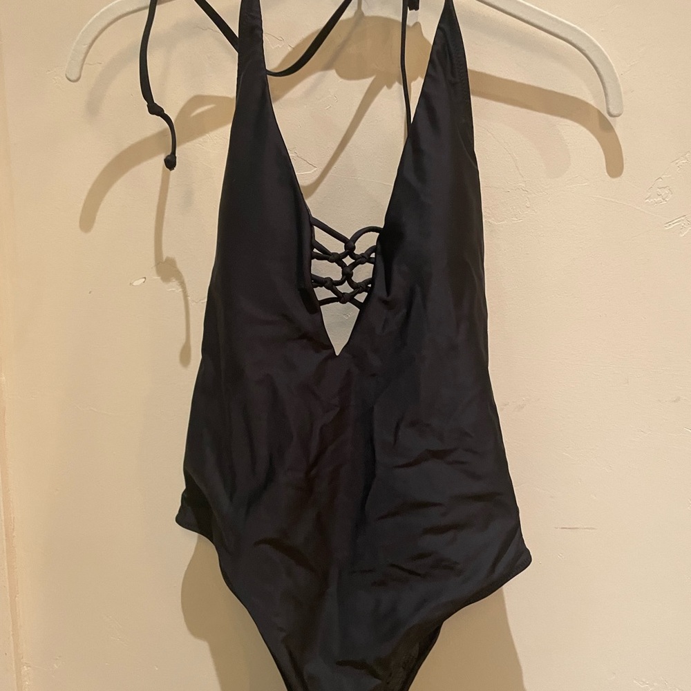 Volcom size S (small) black one piece Worn once! Halter tie neck and logo at hip